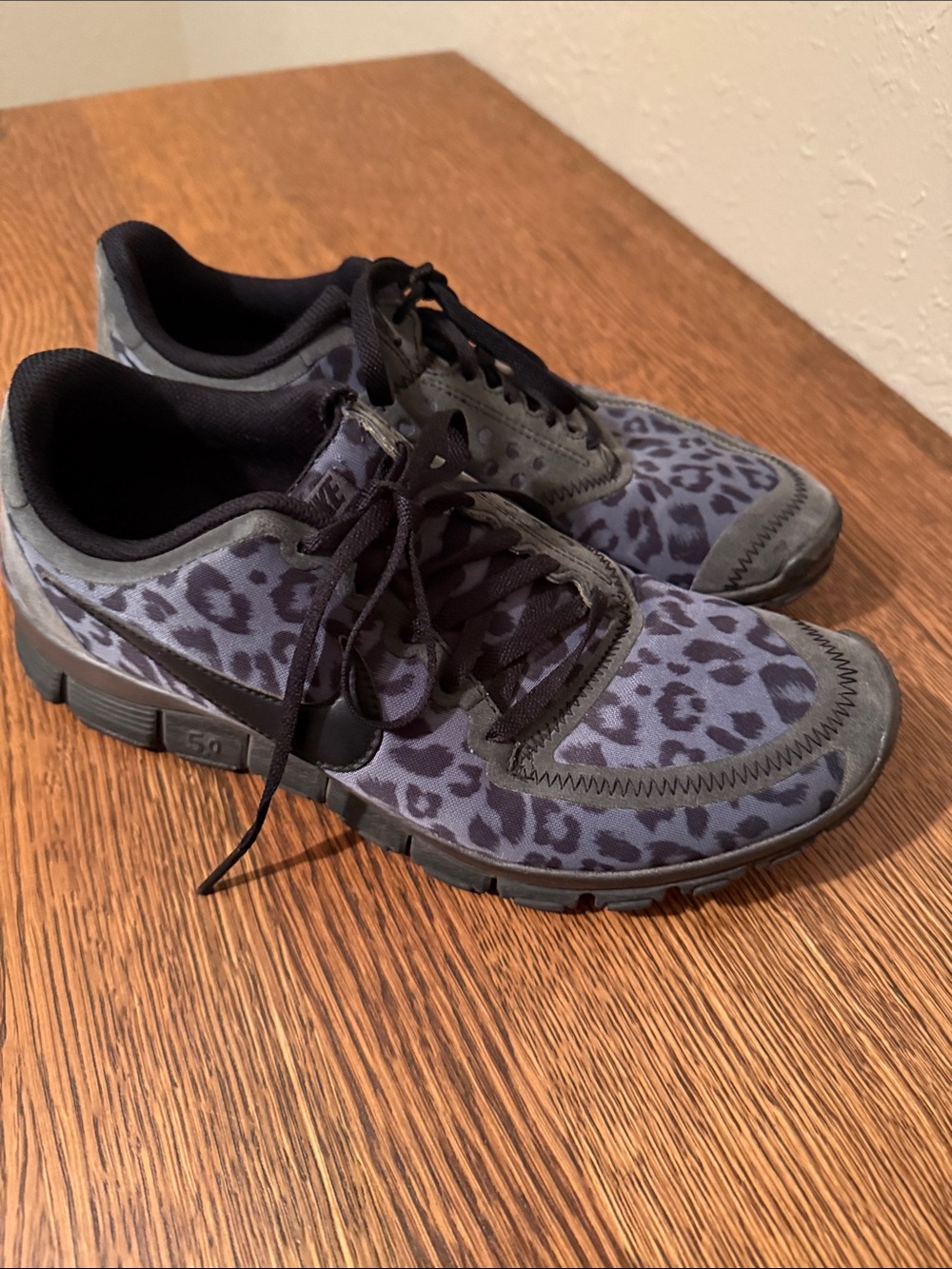 Nike Women's Gray and Black Leopard Print Athletic Shoes